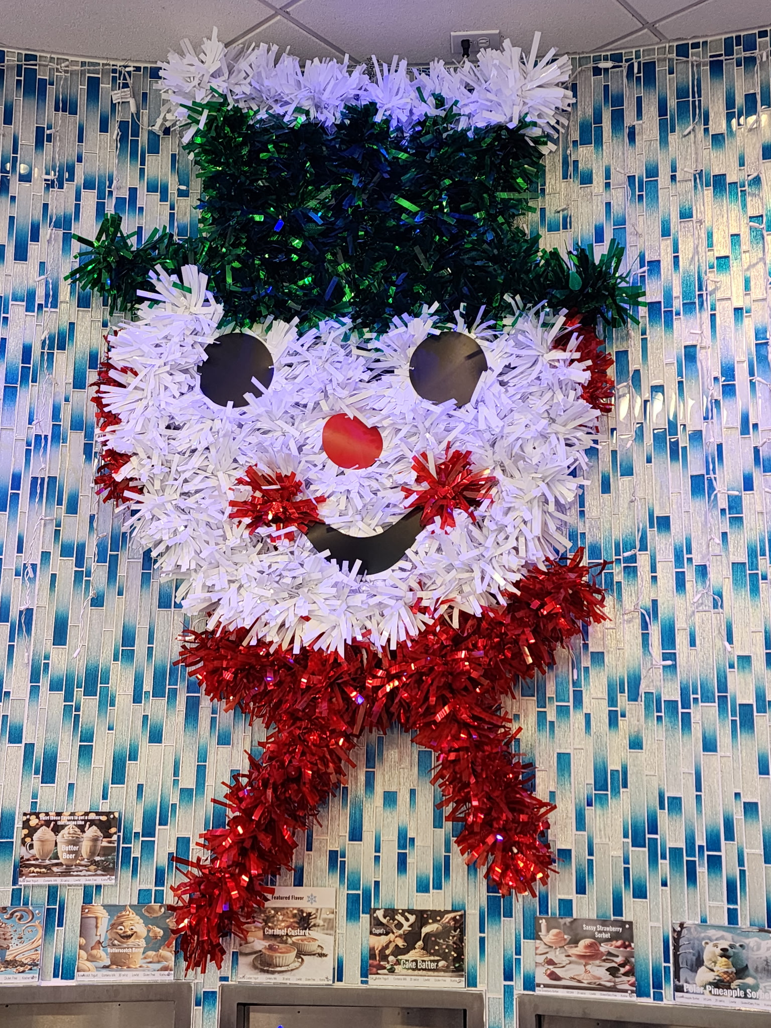 Festive snowman decoration at Frosty Froyo shop in Champions Gate